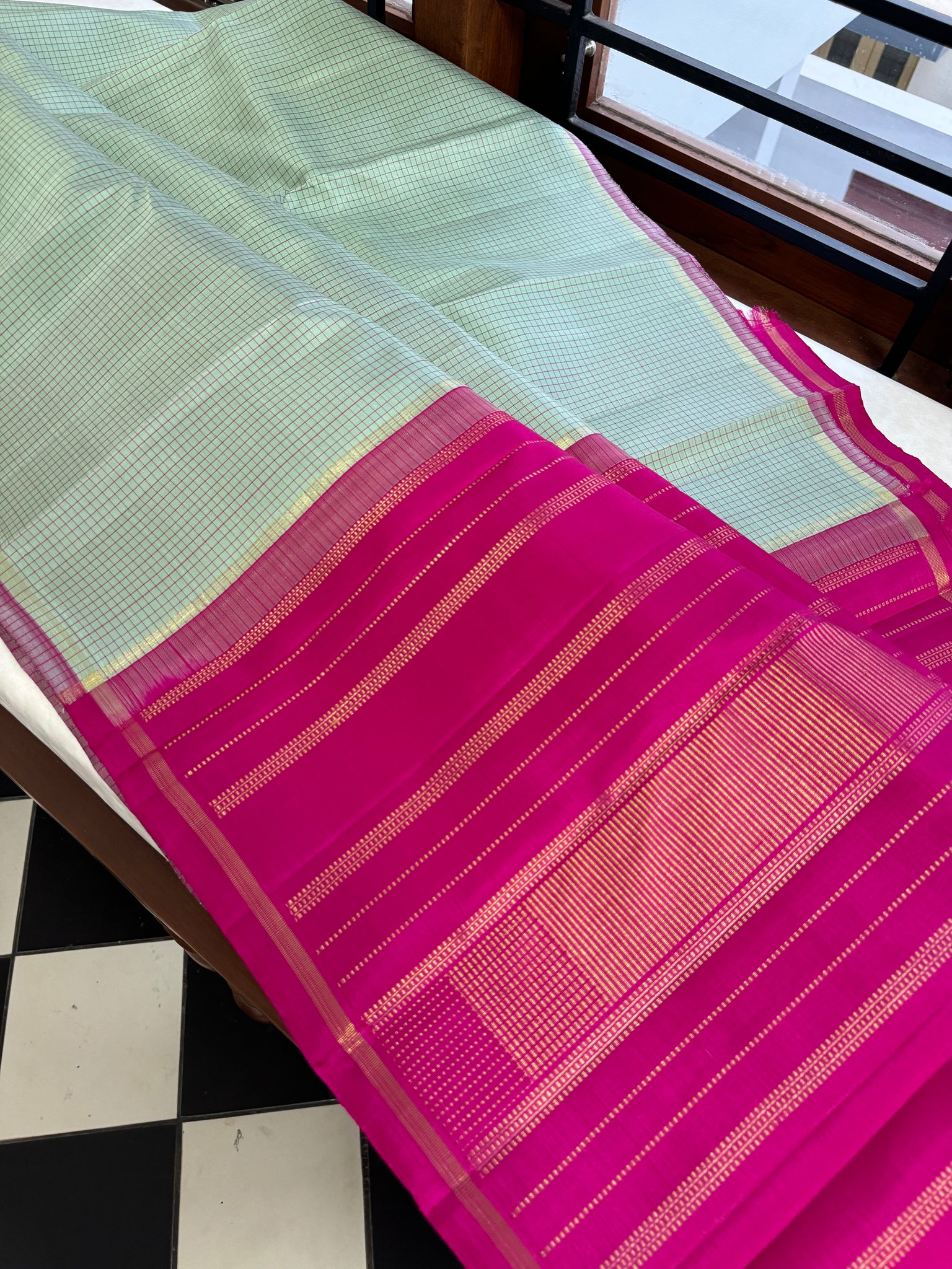 Adhyayam – The No Motifs Kanchivaram - a stunning pastel pista green podi kattam with rain pink pallu and blouse