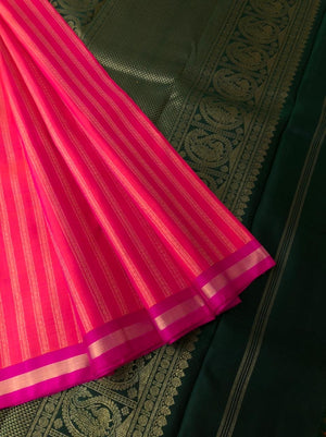 Meenakshi - Kanchivaram for Every Occasion - amazing orange mixed pink vertical muthu stripes woven body with Meenakshi green pallu and blouse