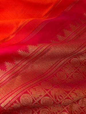 Yarn Play on Kanchivaram - orange and deep red with self weave woven body with chex buttas woven borders