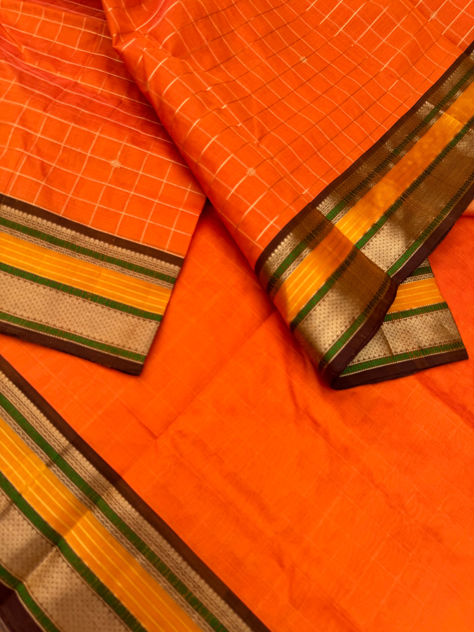 Zari Kissed Silk Cotton - a carrot tone orange with muthu koortha kattam buttas
