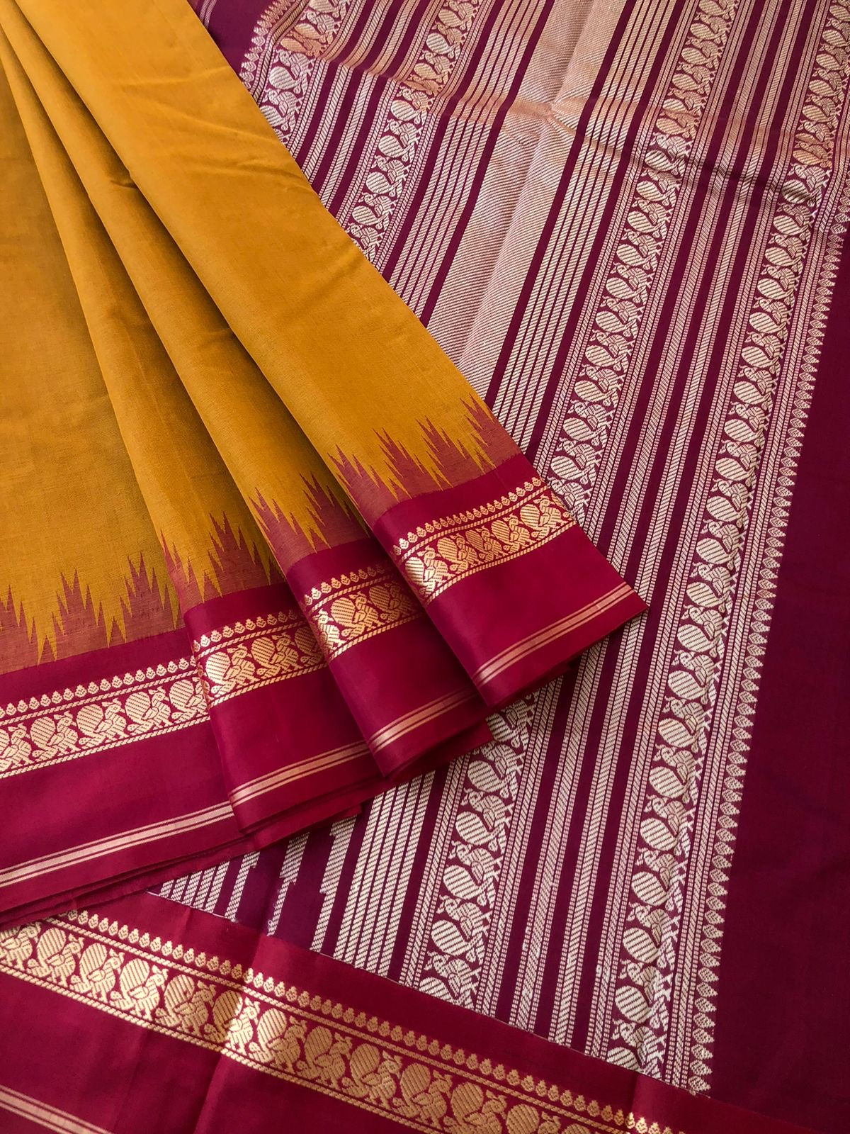 Mira - Our Exclusive Cotton body with Pure Silk Korvai Borders - traditional at the best mustard and deep red with annapakshi woven borders