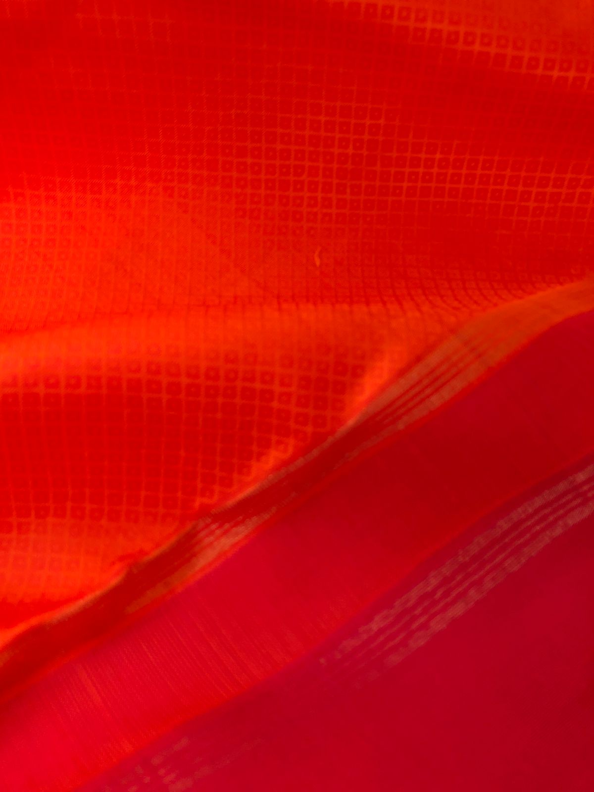 Yarn Play on Kanchivaram - orange and deep red with self weave woven body with chex buttas woven borders
