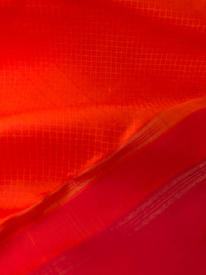 Yarn Play on Kanchivaram - orange and deep red with self weave woven body with chex buttas woven borders