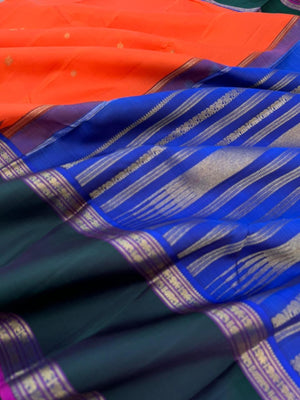 The Korvai Vibes - Authentic Korvai Kanchivaram - gorgeous orange body and forest green borders with royal blue intricate pallu and blouse
