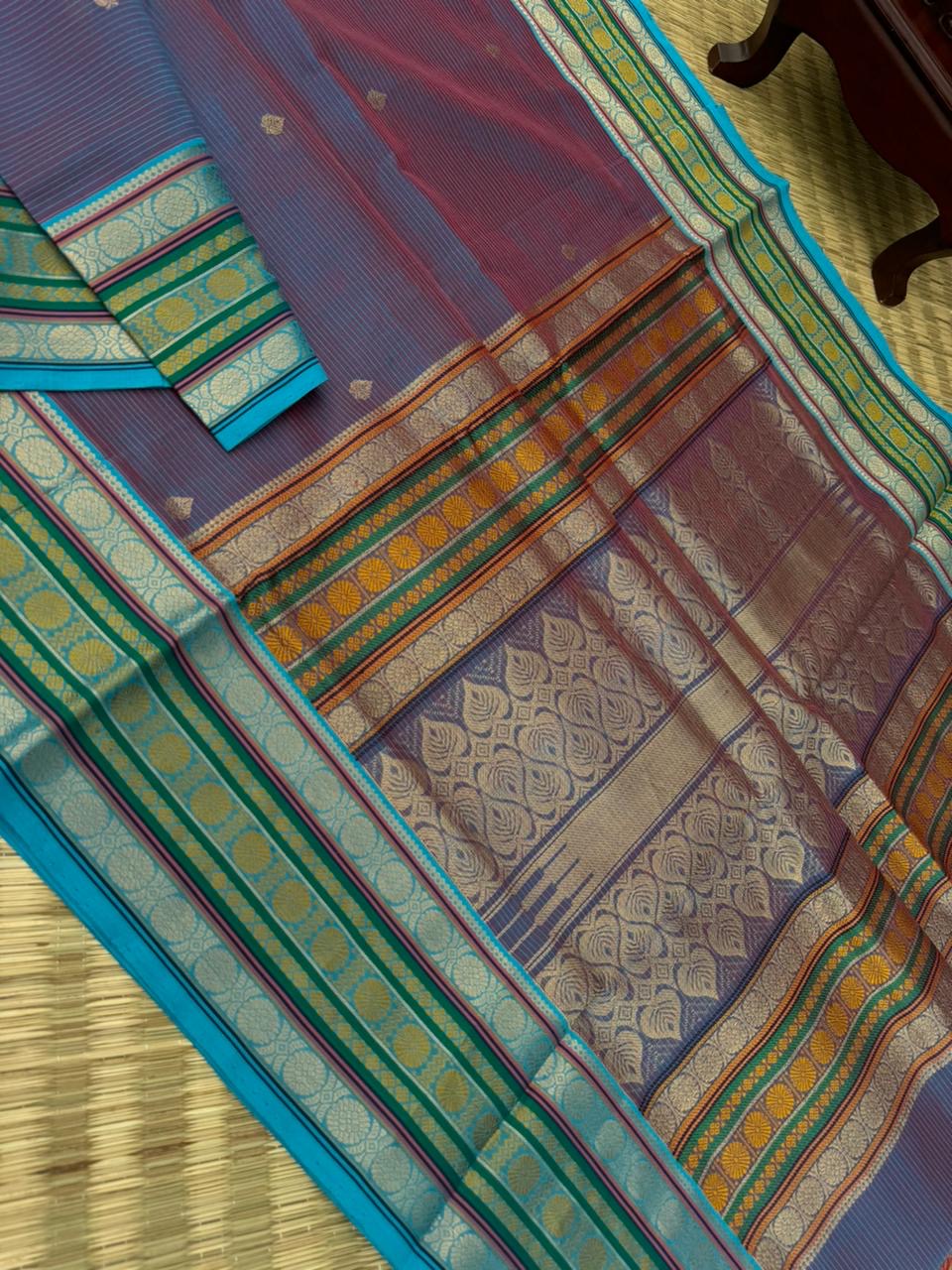 Zari Kissed Silk Cotton - a deep red short blue with laddu Kamalam motifs woven borders