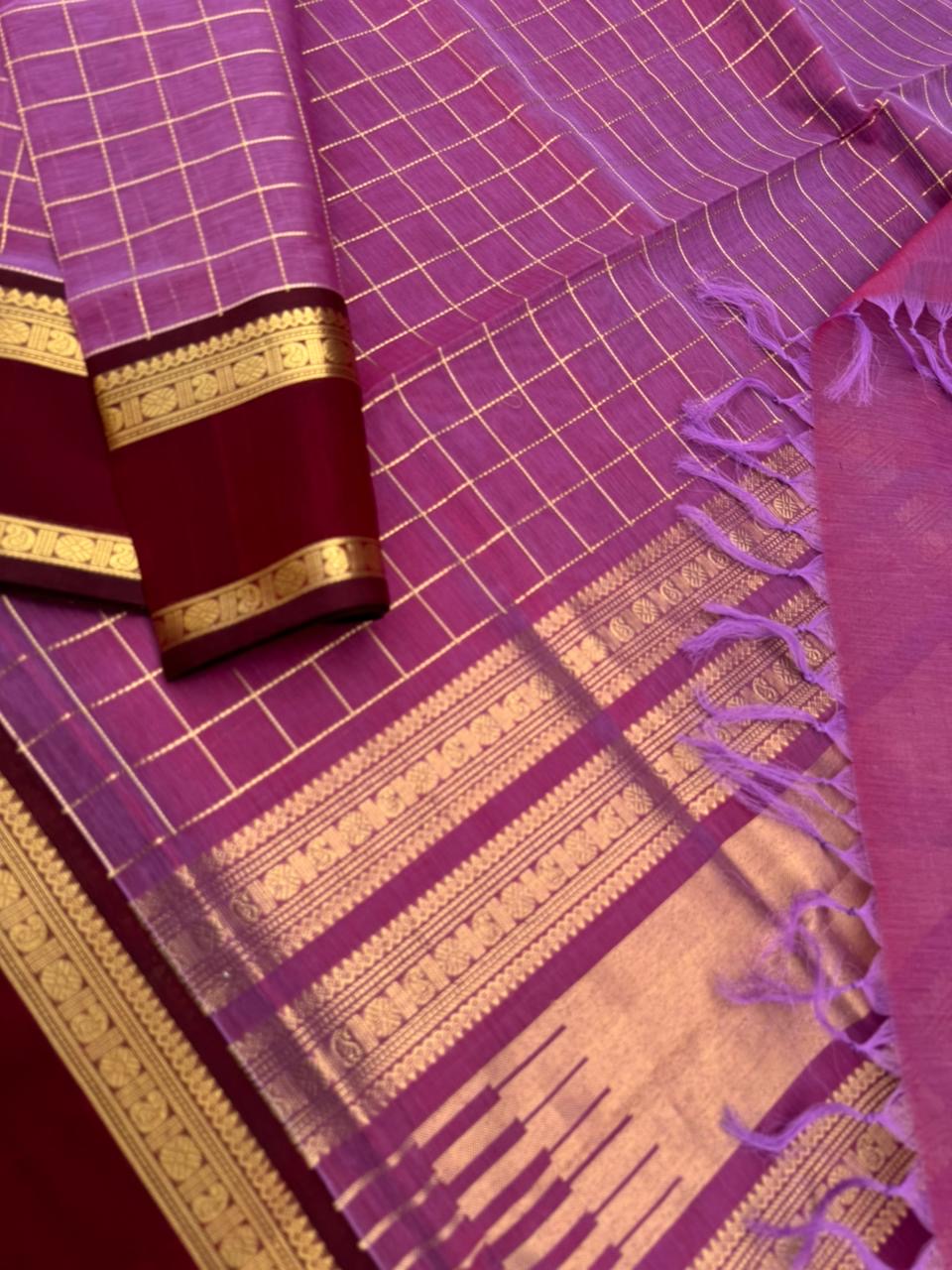 Zari Kissed Silk Cotton - a deep blackcurrant tone muthukattam with retta pett woven borders