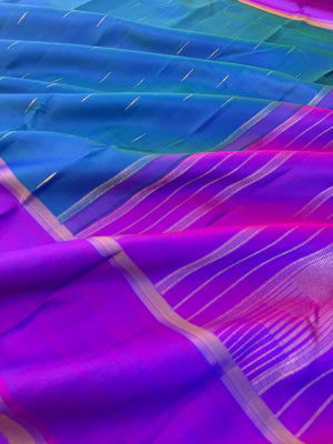 Diwali Edits - Kanchivaram For All Occasions - a perfect dual tone peacock blue green with violet pallu and blouse with rain drops woven buttas