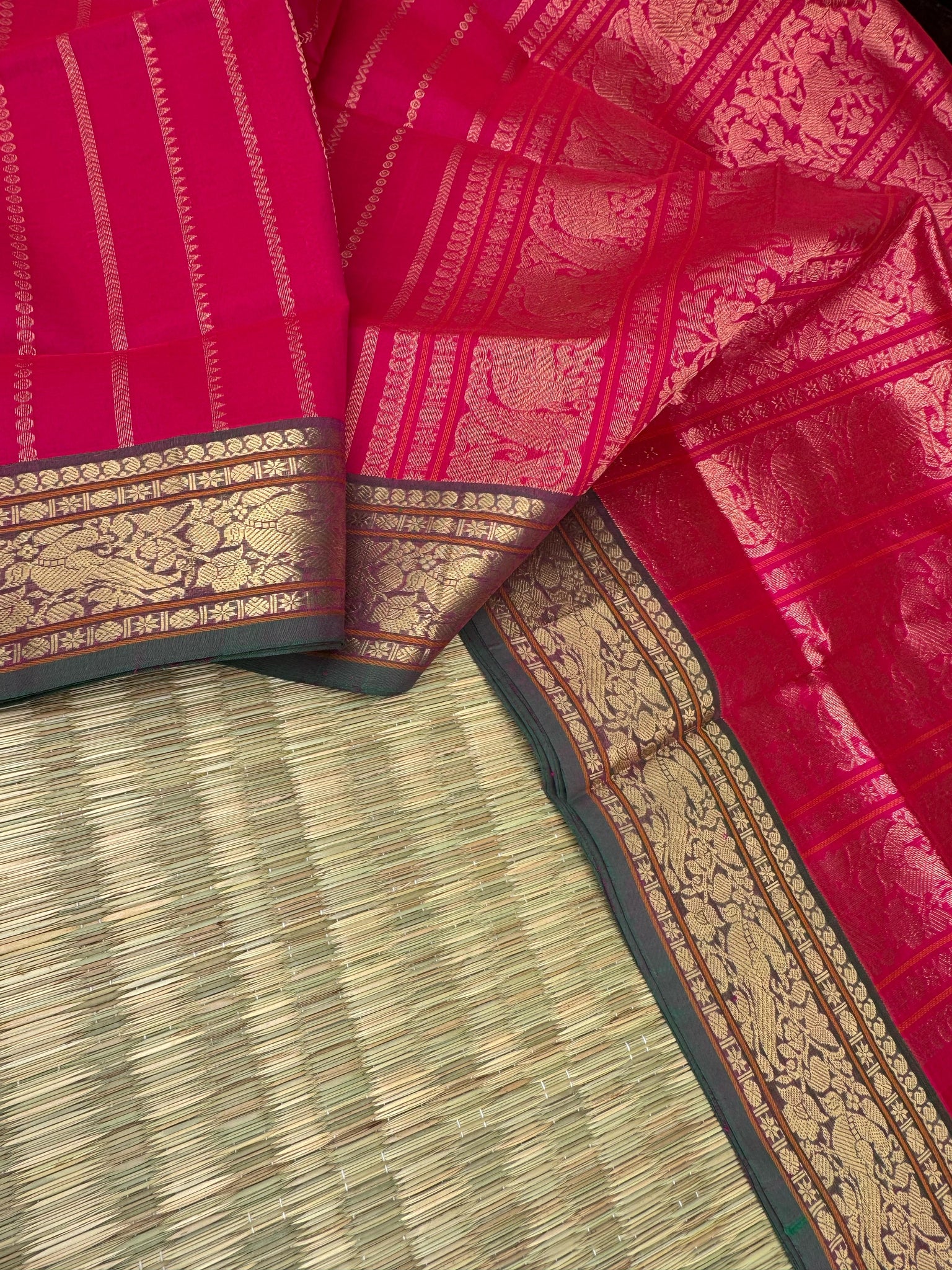 Zari Kissed Silk Cotton - reddish pink vertical veldhari with parrots woven borders