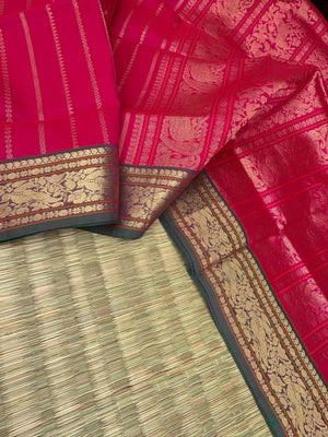 Zari Kissed Silk Cotton - reddish pink vertical veldhari with parrots woven borders