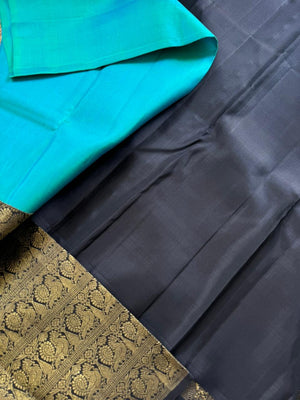 Tasteful Tall Border Kanchivarams - lovely dual tone blue and black with long zari woven one side korvai borders with grand pallu