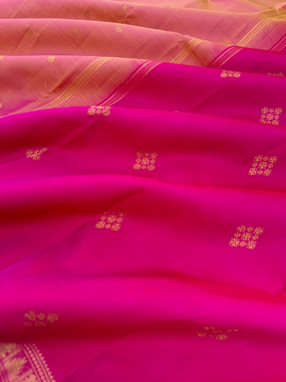 Leela - The bliss of small border Kanchivarams - a peach and pink with different styles buttas woven pallu and blouse
