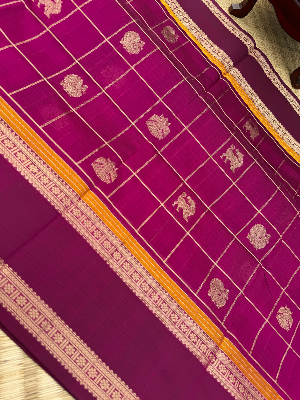 Zari Kissed Silk Cotton - a gorgeous majentha with annam yali and irruthalai pakshi woven buttas