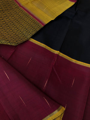 Yarn play on Kanchivaram - gorgeous black maroon fenugreek mubbagam with paisley and rudurakasham veldhari