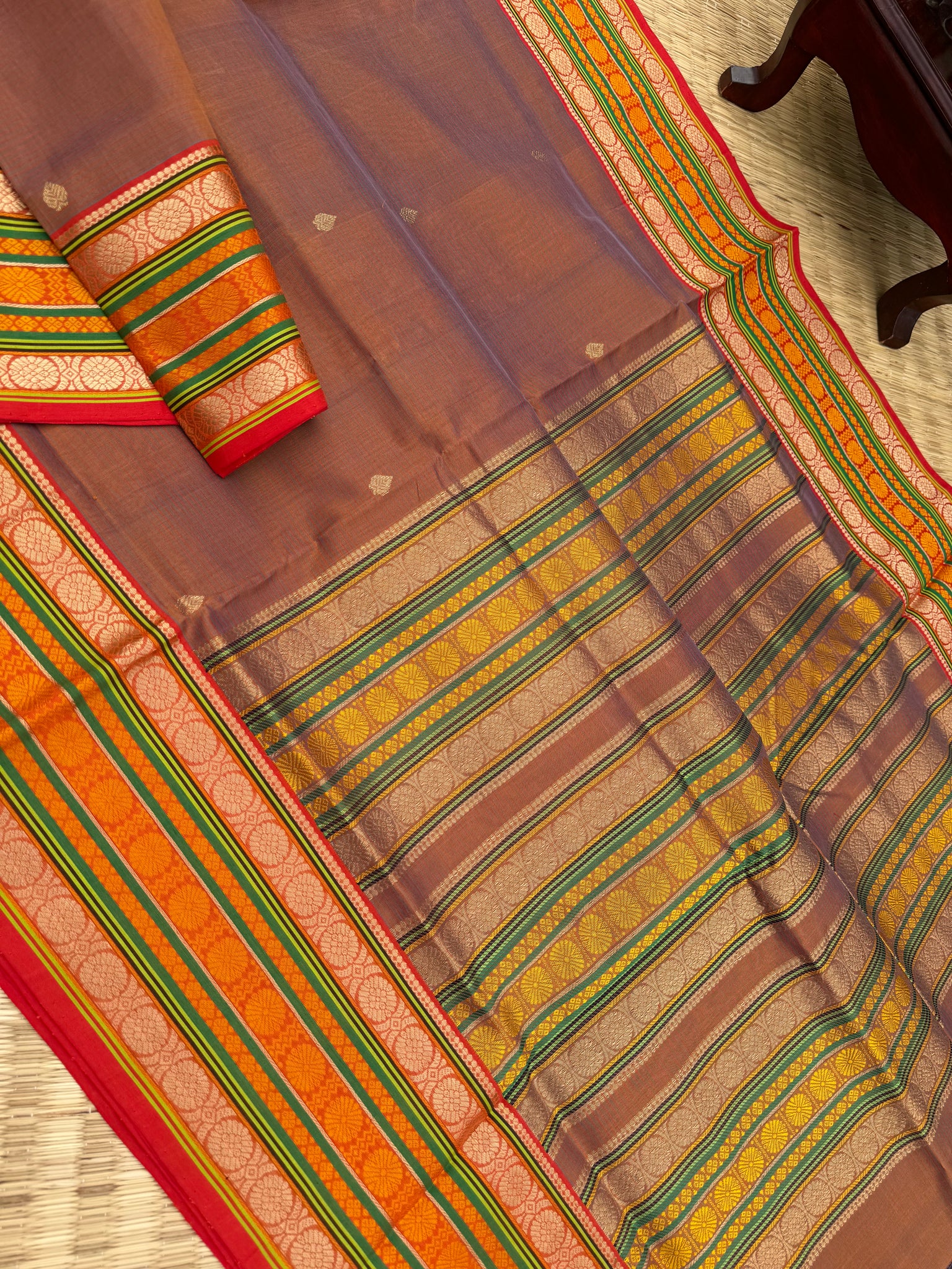 Zari Kissed Silk Cotton - a caramel mustard dual tone varusai pett woven border