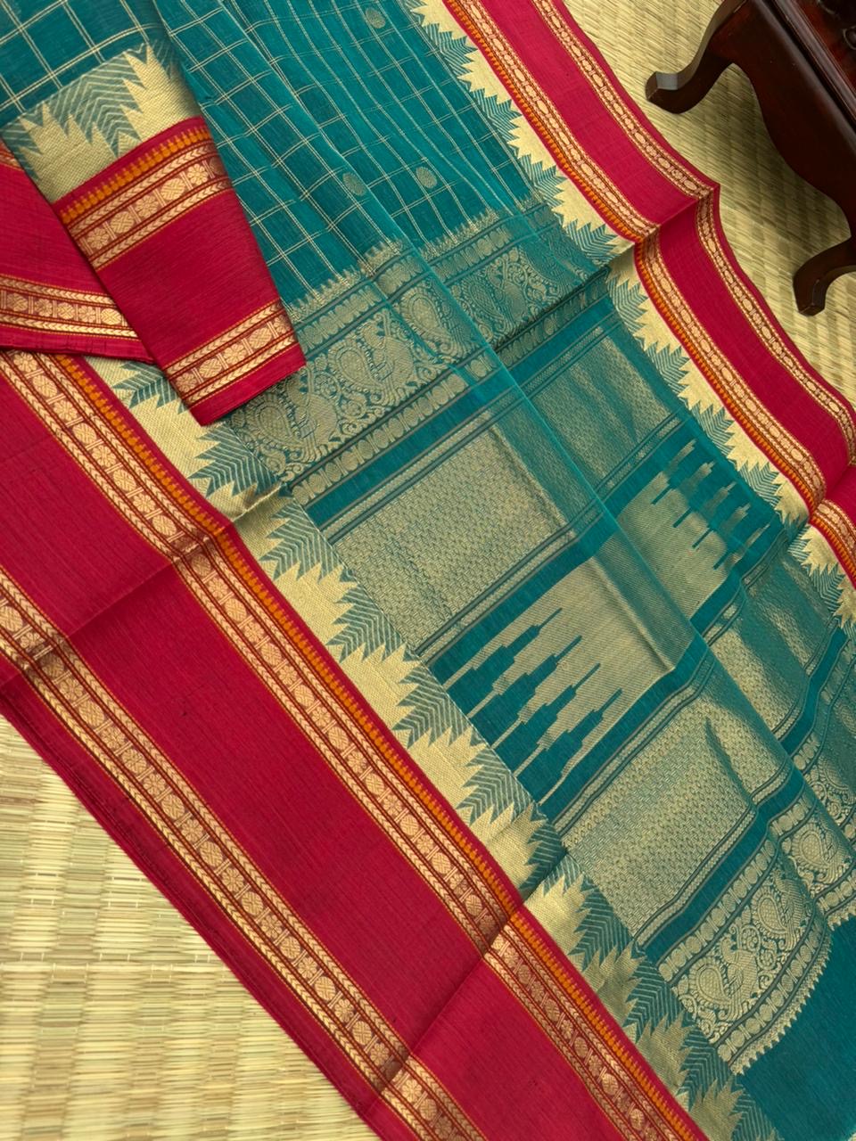 Zari Kissed Silk Cotton - unusual burnt blue with all traditional elements kattam buttas thalampoo retta pett borders