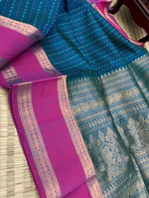 Woven Motifs Silk Cotton - a dark peacock blue lakshadeepam with retta pett woven borders