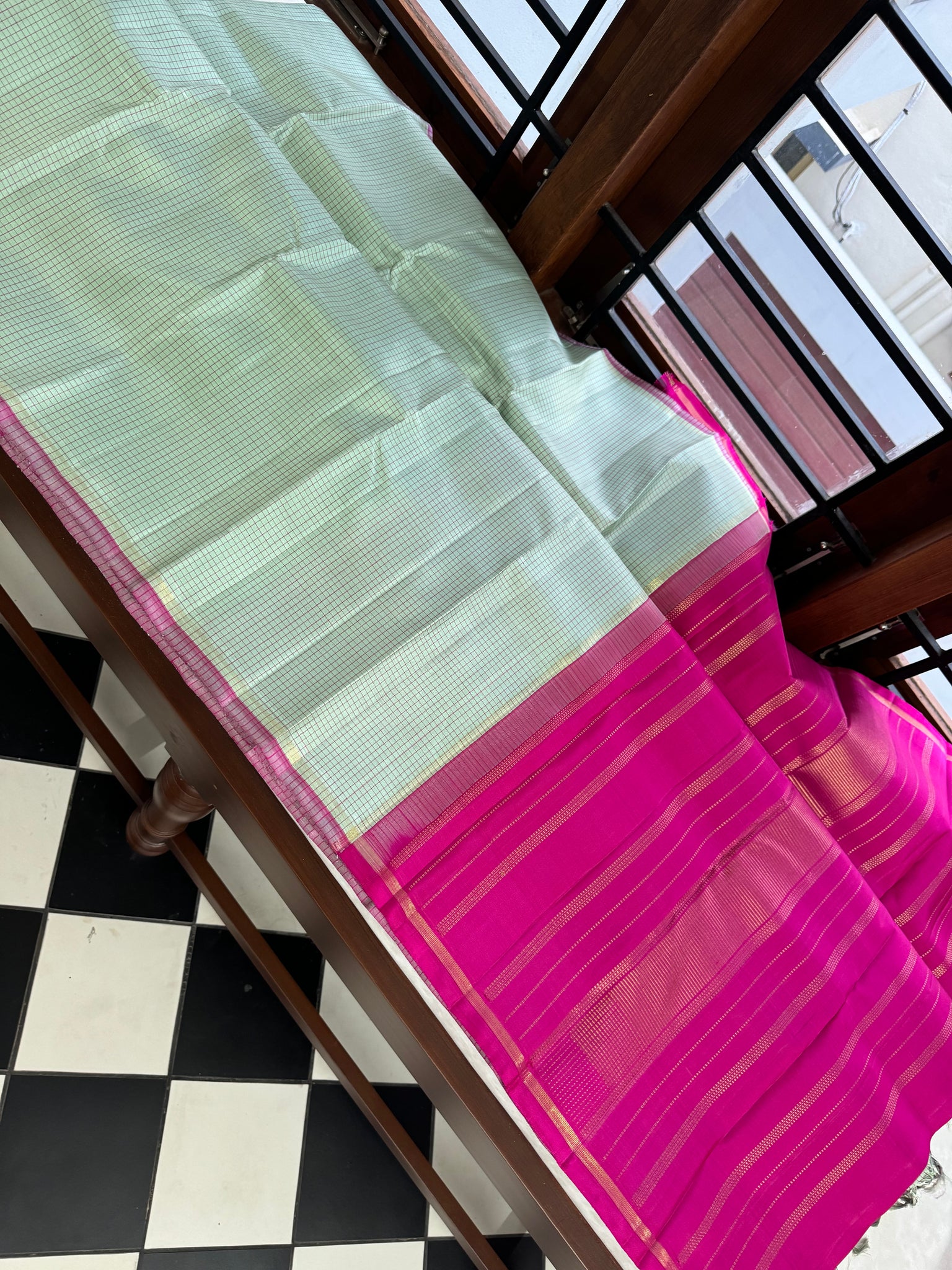 Adhyayam – The No Motifs Kanchivaram - a stunning pastel pista green podi kattam with rain pink pallu and blouse