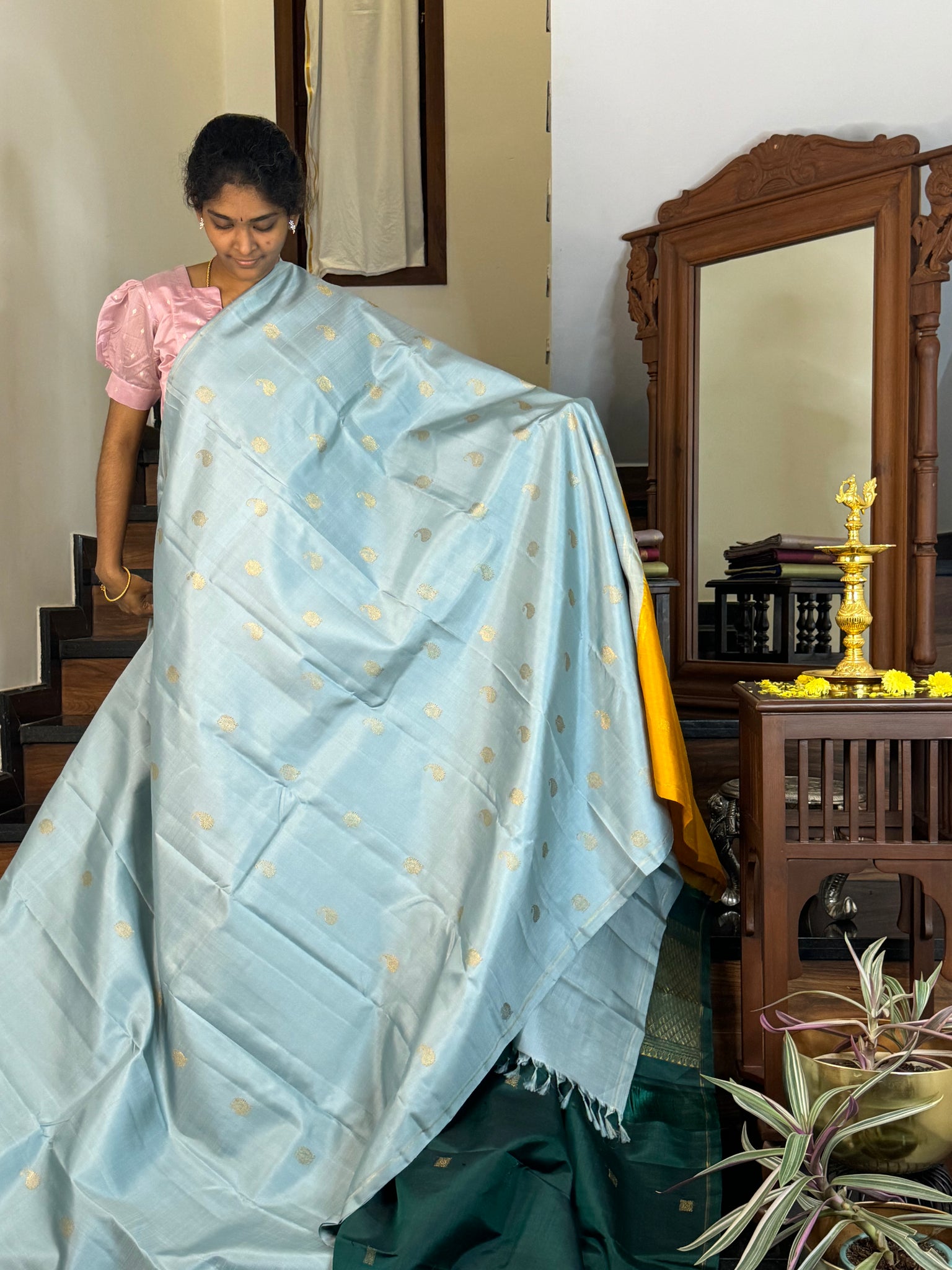 Mohaa - Beautiful Borderless Kanchivaram - pastel baby blue witb paisley and annam buttas with double pallu concept with bottle green blouse