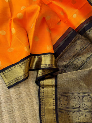 Meenakshi Kalayanam - Connected By Korvai - the best of best mango yellow mixed orange and black korvai borders