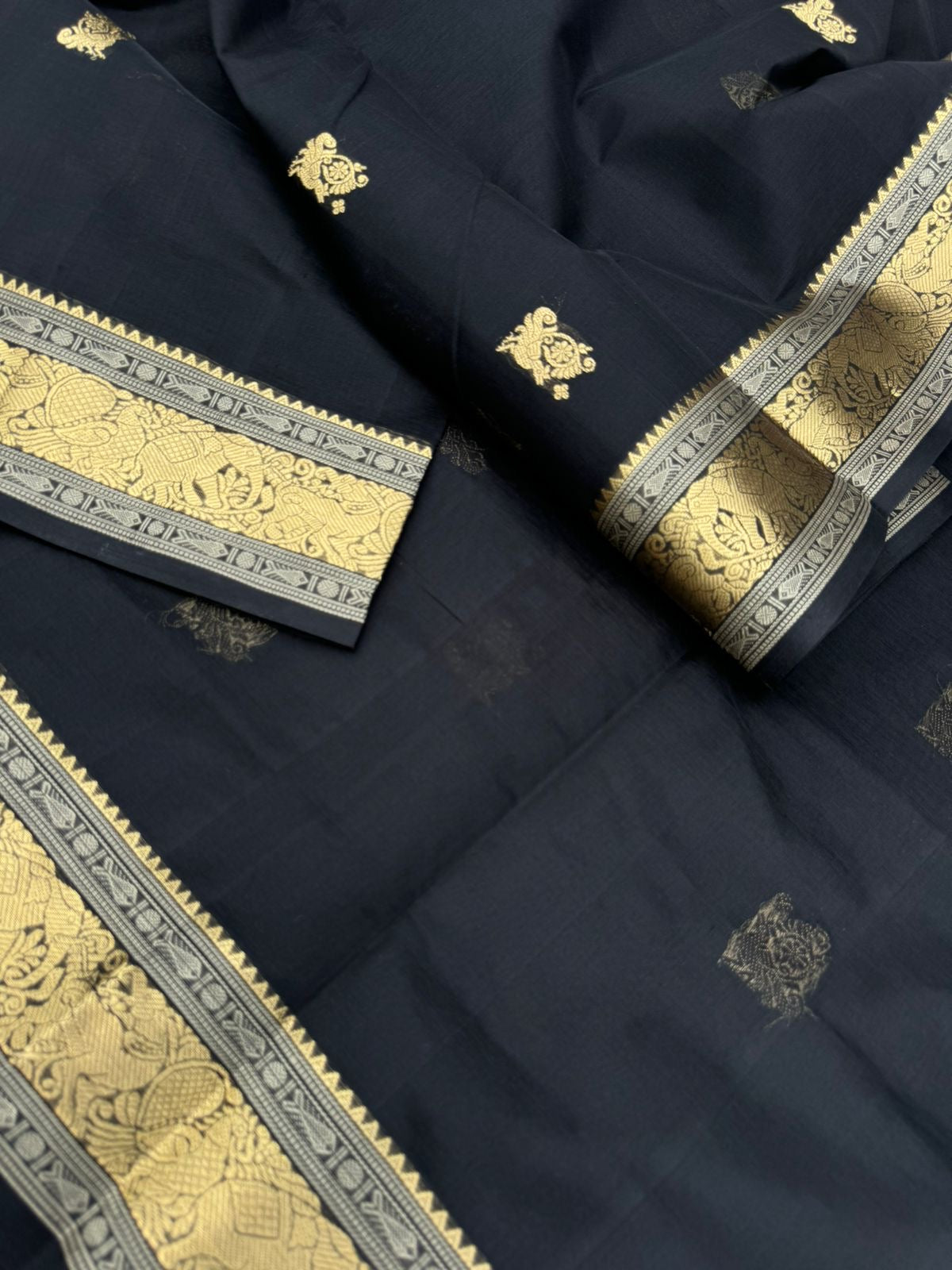 Black Edition of Zari Kissed Silk Cotton - stunning black and gold with annapakshi elephant yali woven borders