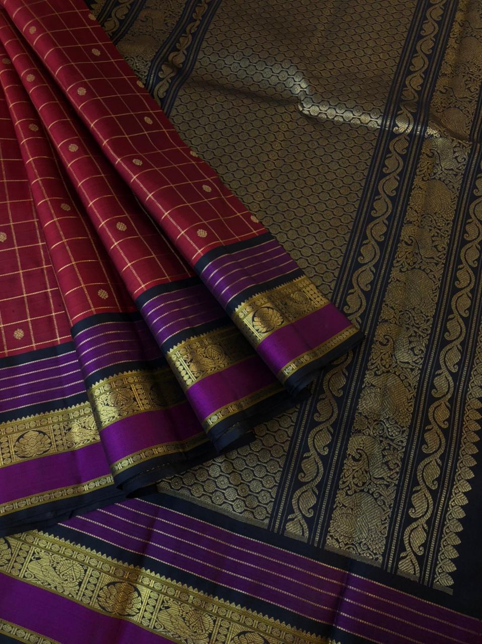 Varam - Kanchivarams Inspired from our Grandmother’s Trunk - deep dark maroon and black traditional Kanchivaram with chex buttas woven body with moppula woven borders