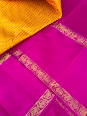 Essence of Traditional Kanchivarams - a gorgeous vintage type broad borders mustard and sweet pink full body woven pluse buttas