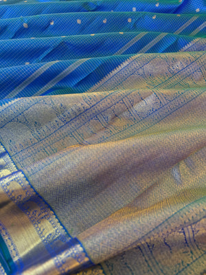 Statement of Kanchivaram - KK1 - the most beautiful dual tone peacock blue green Vairaoosi kattam with small woven borders with gorgeous grand pallu.