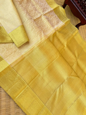 Aandal - The grandeur Kanchivaram - gorgeous butter and gold tone full body end to end zari woven parrots body
