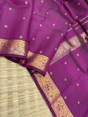 Parvathi - deep dark majentha purple with horse and elephants woven borders
