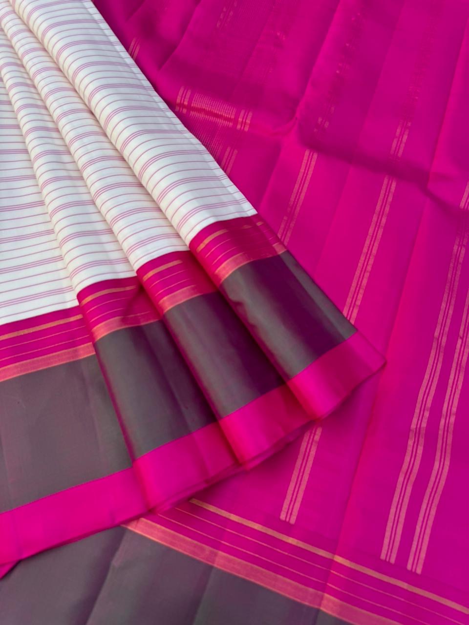 Recipe of Rarest Korvai Kanchivaram - off white stripes woven body with pink and short green korvai borders