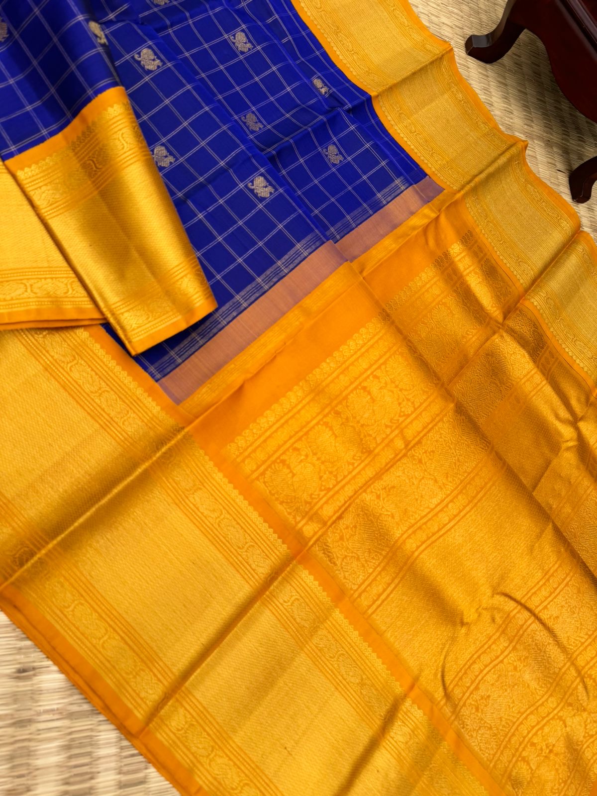 Colours of Navarathri 2025 on Kanchivaram - most grandest and most solid deep blue and golden mustard Korvai Kanchivaram with full gold zari woven broad borders with mayil chackaram woven buttas