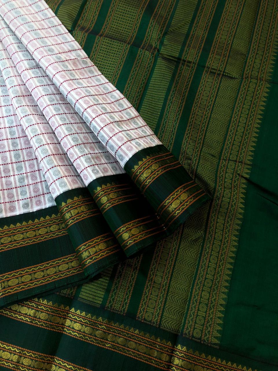 Divyam - Korvai Silk Cotton with Pure Silk Woven Borders - off white and Meenakshi green Lakshadeepam