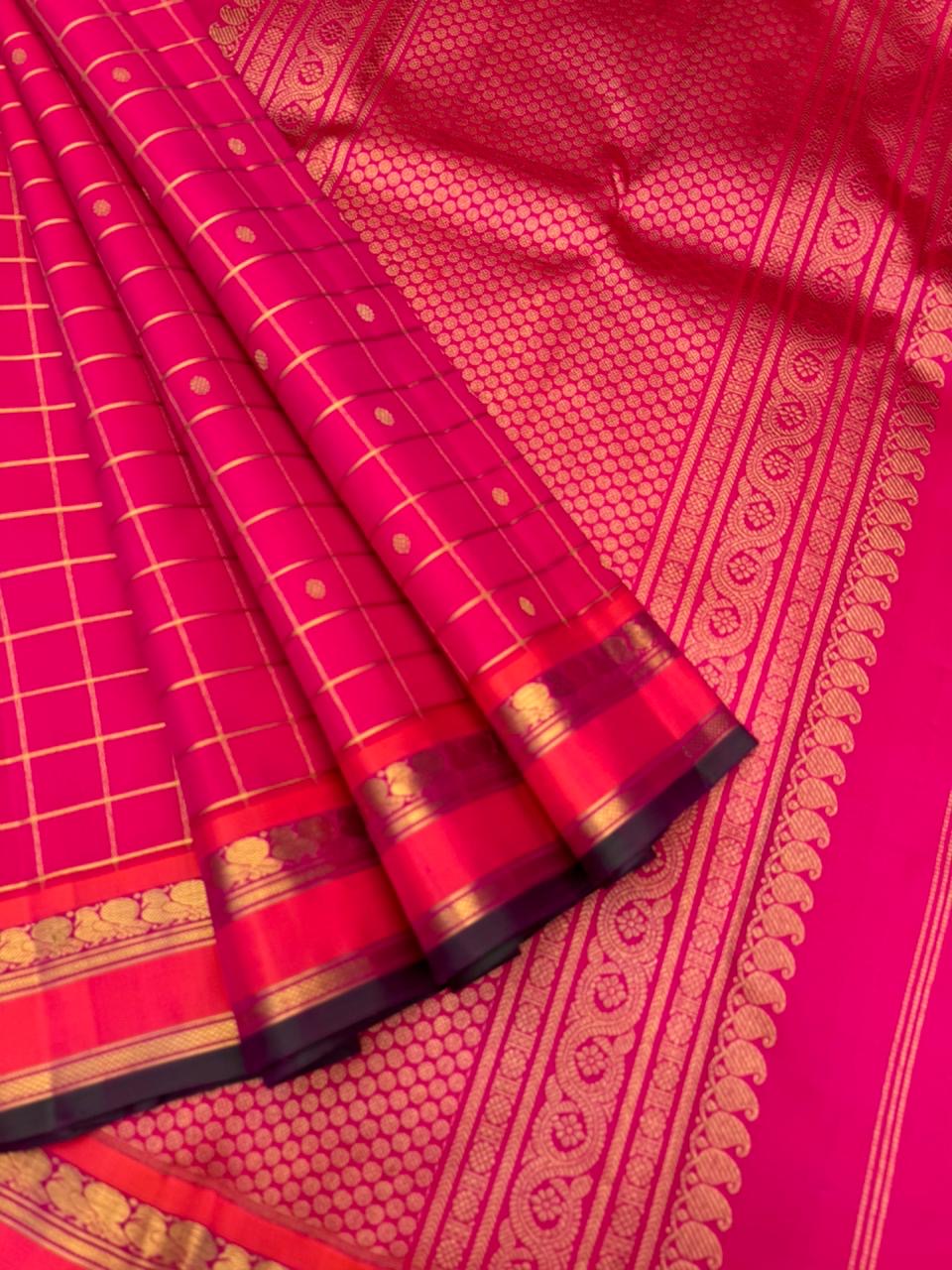 Vintage Ragas on Kanchivaram - a traditional pink with kattam and buttas body with annapakshi woven borders