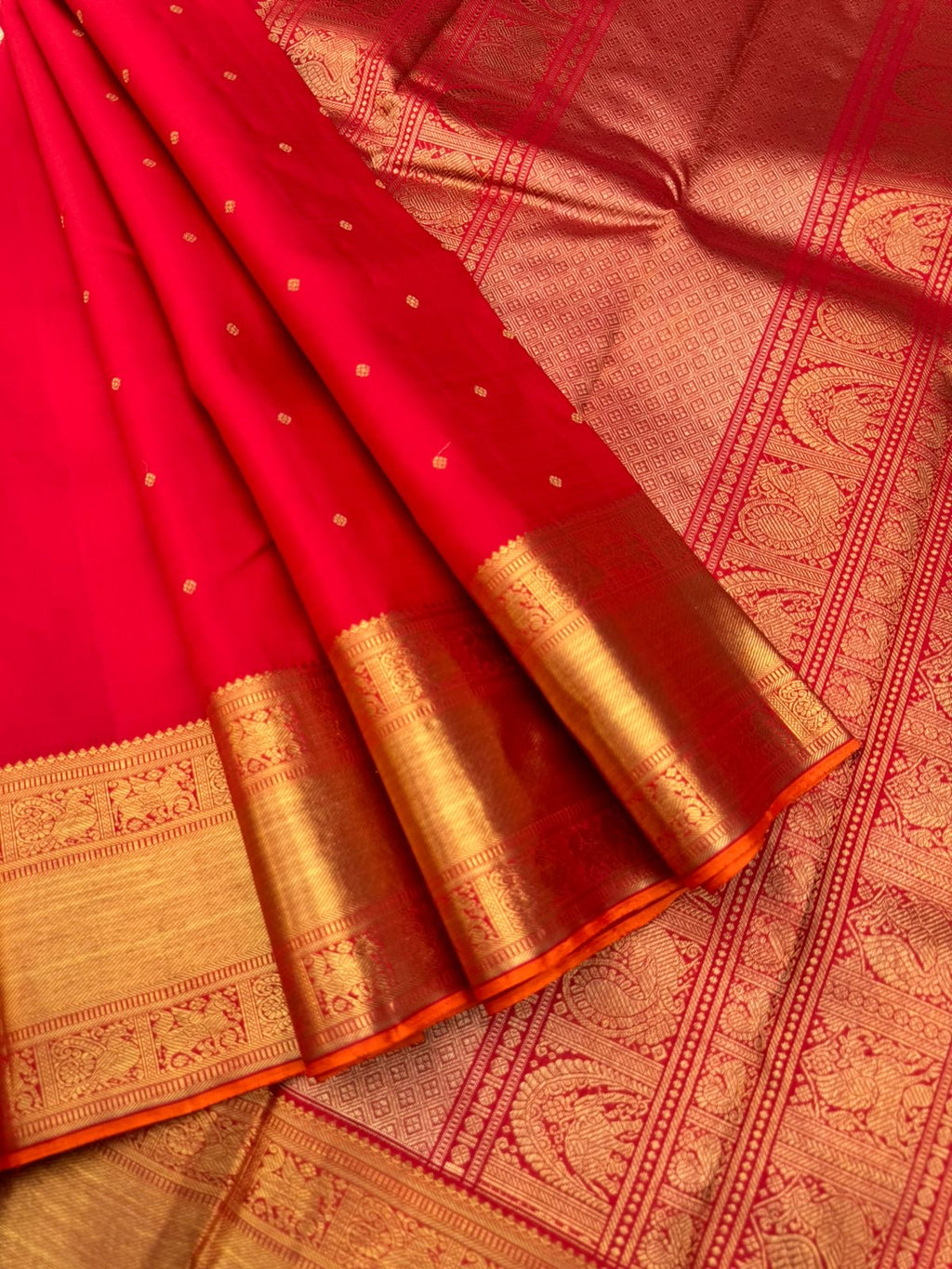 Kamakshi -the gorgeous red and gold with solid gold zari woven borders and pallu