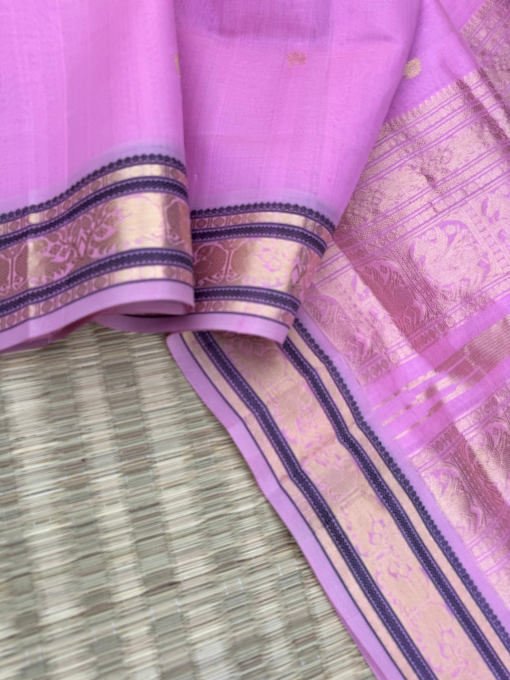 Pastels on Zari Kissed Silk Cotton - baby pink with parrots woven borders
