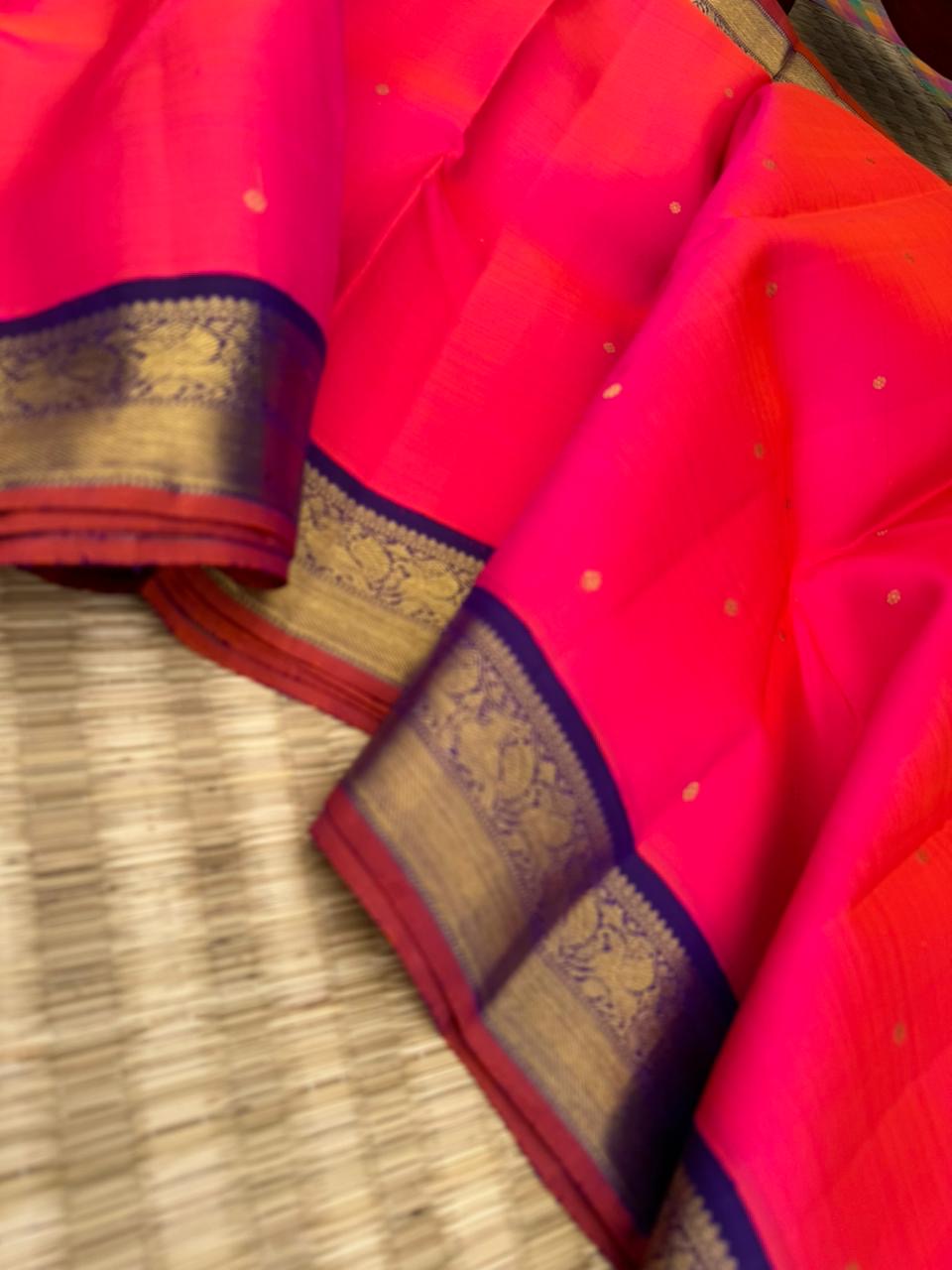 Meenakshi - Heirloom Korvai Kanchivaram - a beautiful kanakambaram pink mixed orang tone with deep ink violet yali pallu
