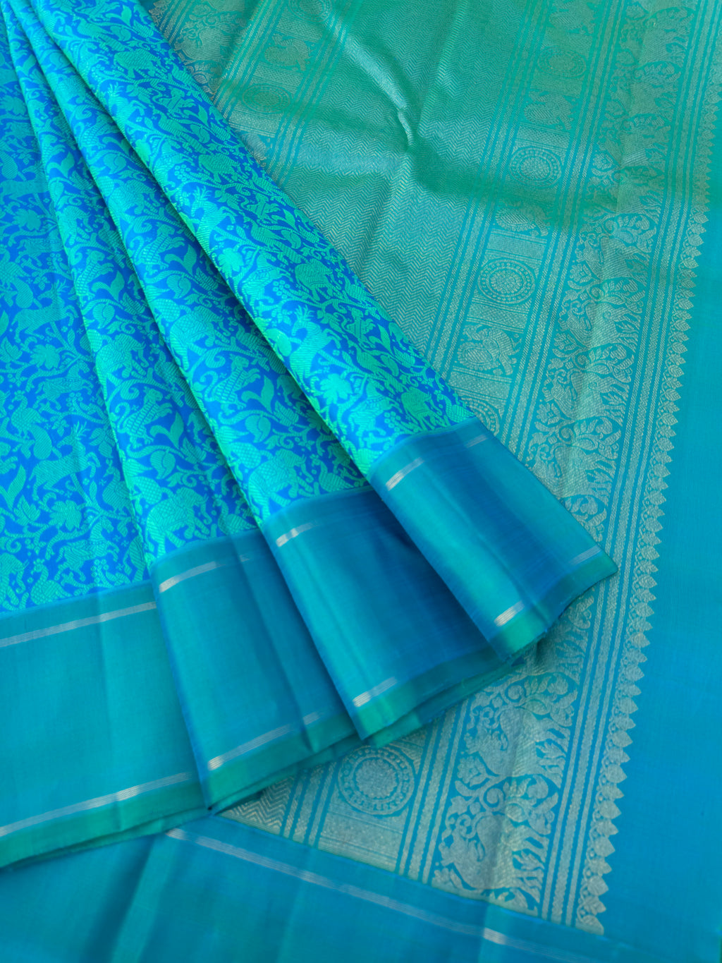 Diwali Edits - Kanchivaram For All Occasions - a stunning anandha blue on blue vanasingaram body with gold zari woven pallu