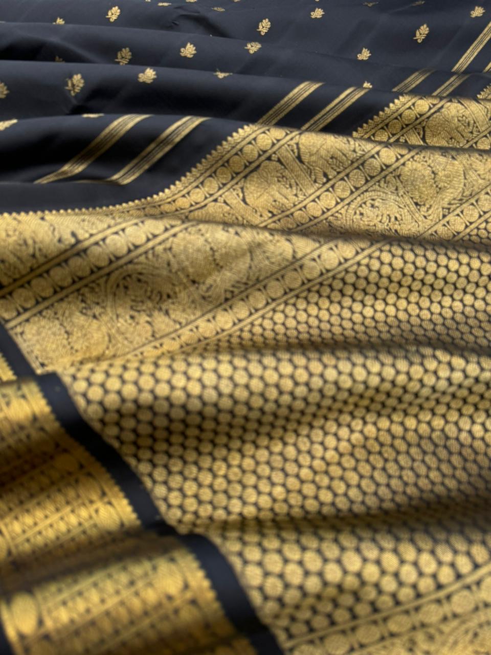 Vintage Ragas on Kanchivaram - a rarest gem of this collection, a full black and gold with old charm bettu buttas woven borders