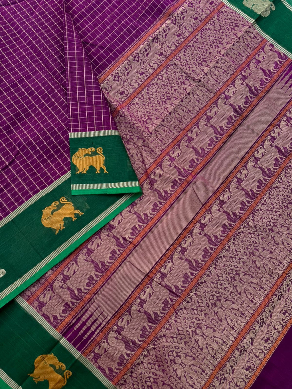 Mangalavastaram - deep brinjal purple muthu kattam with border woven yali and annapakshi woven buttas