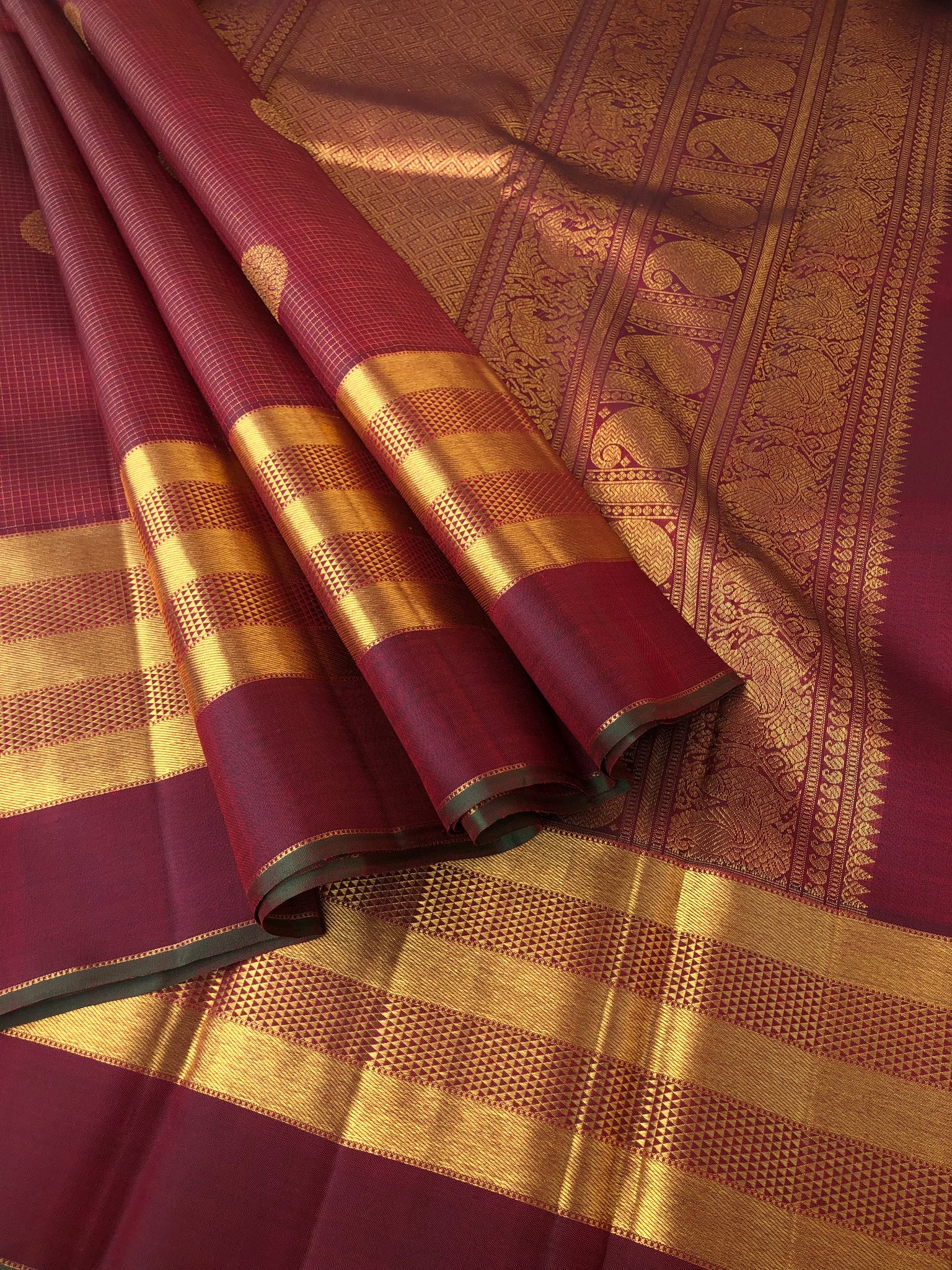 Kamakshi - One of  a Kind Kanchivaram - the grand of grandest aaraku maroon Vairaoosi kattam with chackaram woven buttas on 5 row woven aarai maadam borders