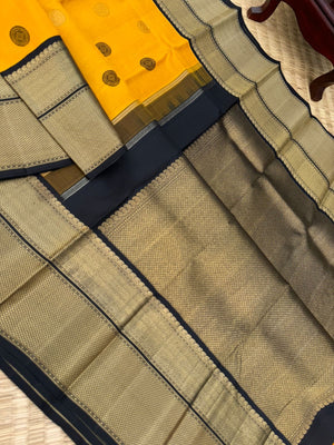 Colour Play on Kanchivaram - vintage style yellow and black korvai Kanchivaram with zari and silk thread woven unique borders