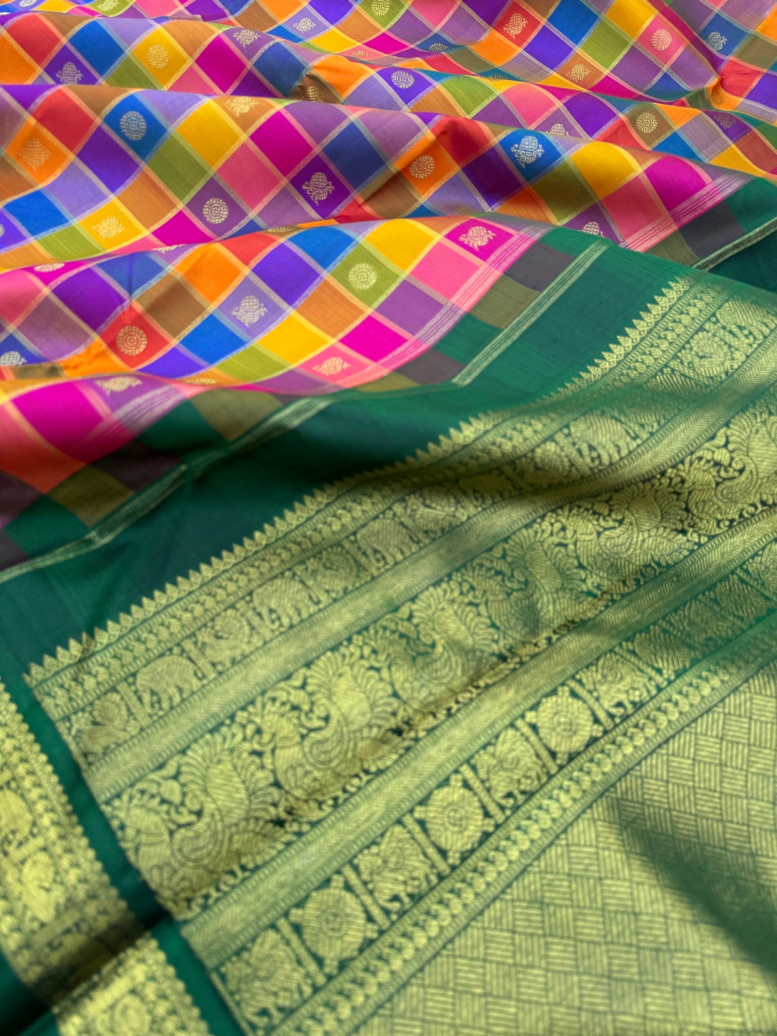 Paalum palamum kattam on Kanchivaram - a one of a kind blue pink mustard chex with bottle green vintage borders pallu and blouse