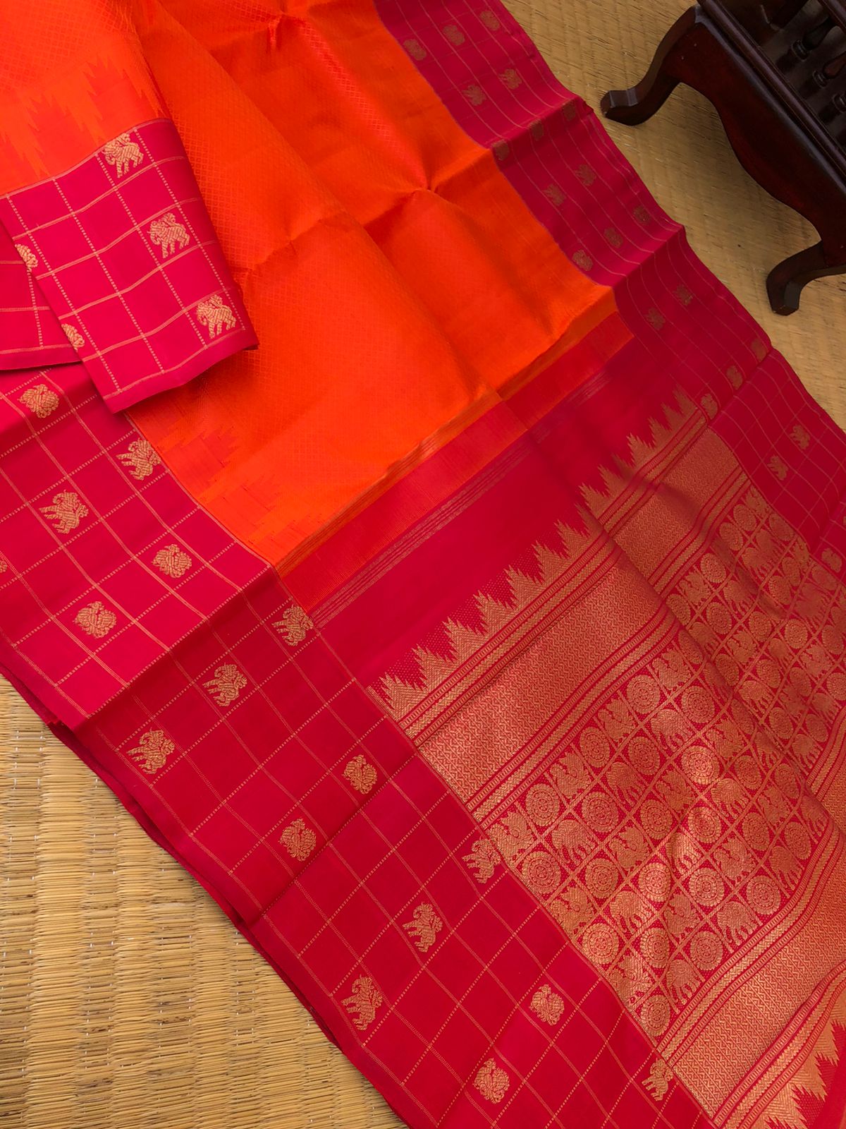 Yarn Play on Kanchivaram - orange and deep red with self weave woven body with chex buttas woven borders