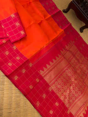Yarn Play on Kanchivaram - orange and deep red with self weave woven body with chex buttas woven borders