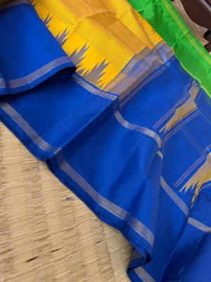 Art of Kai Korvai Kanchivaram - mustard strips woven body with blue and green ganga jammuna woven borders