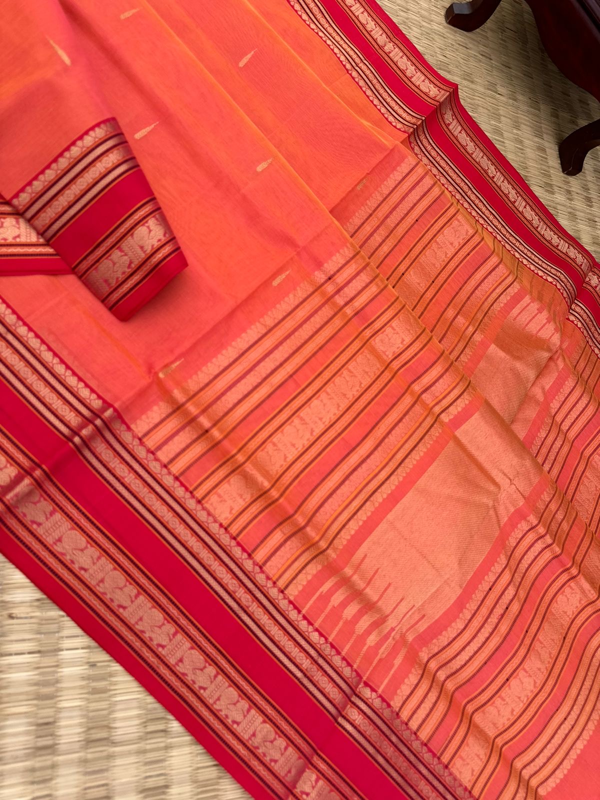 Zari Kissed Silk Cotton - a peach kanakambaram rain drop woven buttas