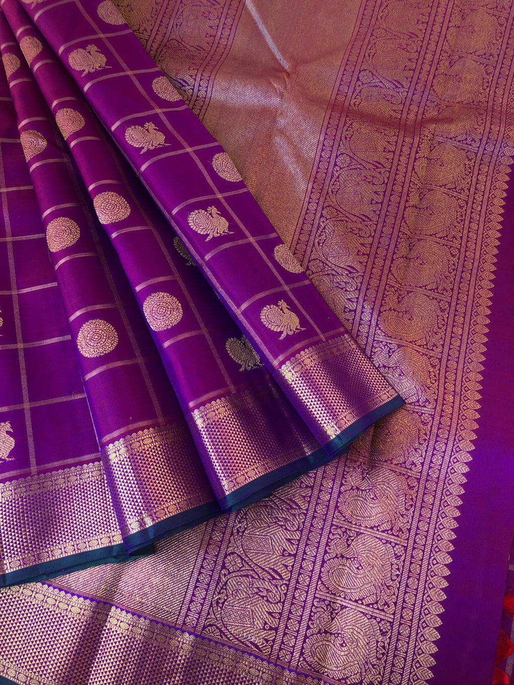 Swarnam - The Solid Kanchivarams - stunning red short purple mayil chackaram with solid gold zari woven aarai maadam woven borders