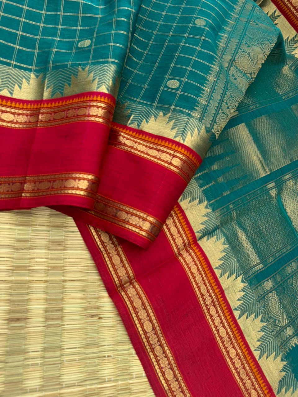 Zari Kissed Silk Cotton - unusual burnt blue with all traditional elements kattam buttas thalampoo retta pett borders