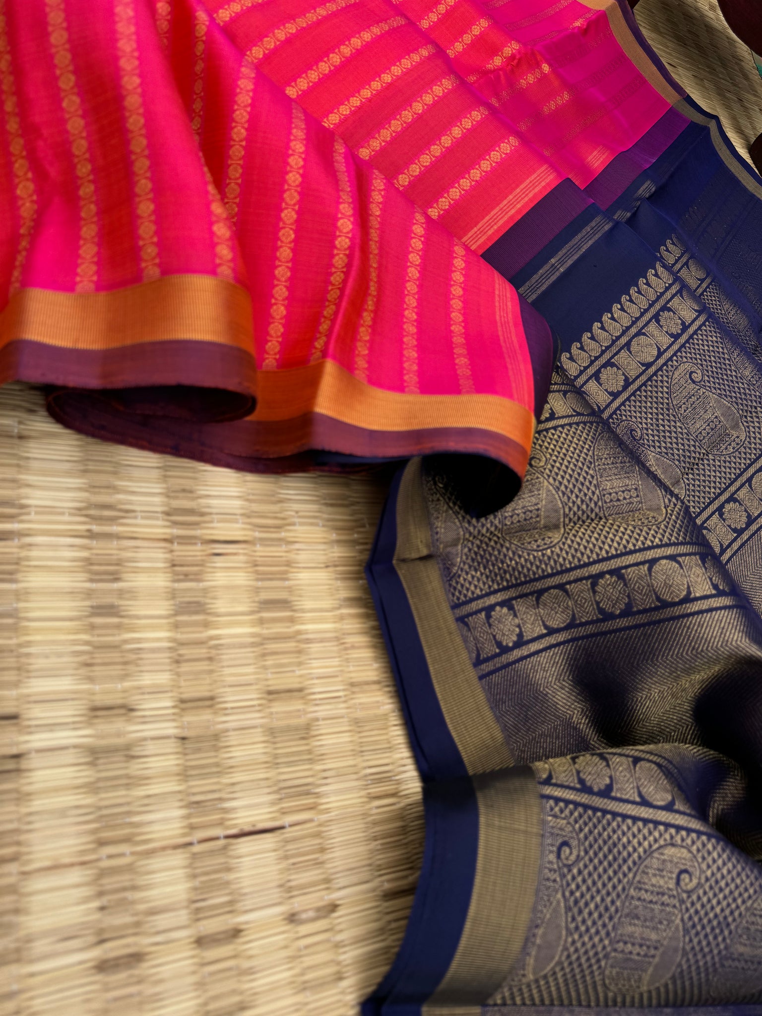 Album Untouched - a stunning orange mixed pink dual tone rudurakasham woven vertical veldhari with deep navy blue pallu and blouse