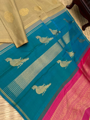 Mohaa - Rarest Borderless Kanchivarams - a biscuit tone irruthalaipakshi butta body with two solid colours uniquely woven pallu